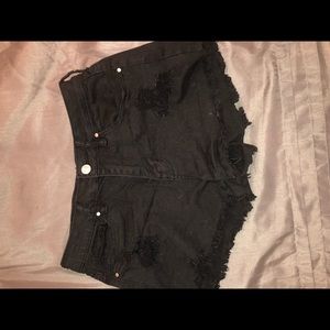 Black distressed jean shorts